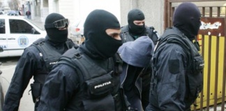 13 percheziții domiciliare într-un dosar instrumentat de polițiștii vasluieni