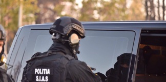 Mandat pus în executare cu ajutorul mascaților